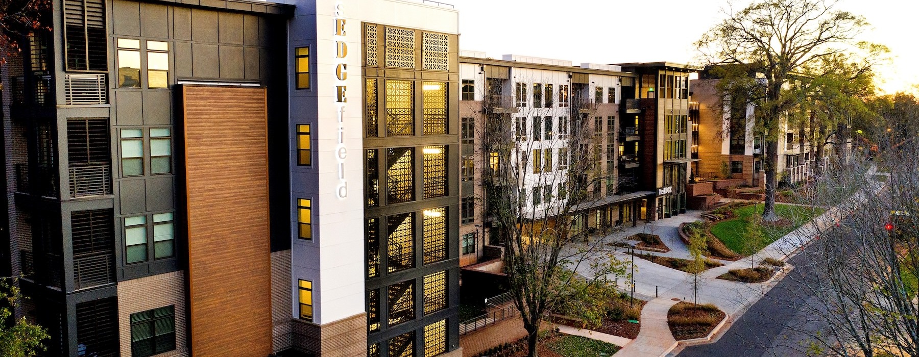 an apartment building with trees