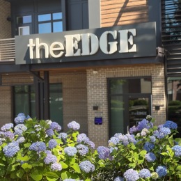 building exterior view with flowers
