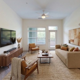 living room with couch and natural lighting