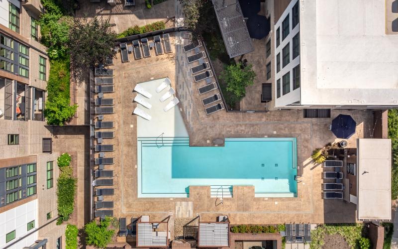 a building with a pool in the front
